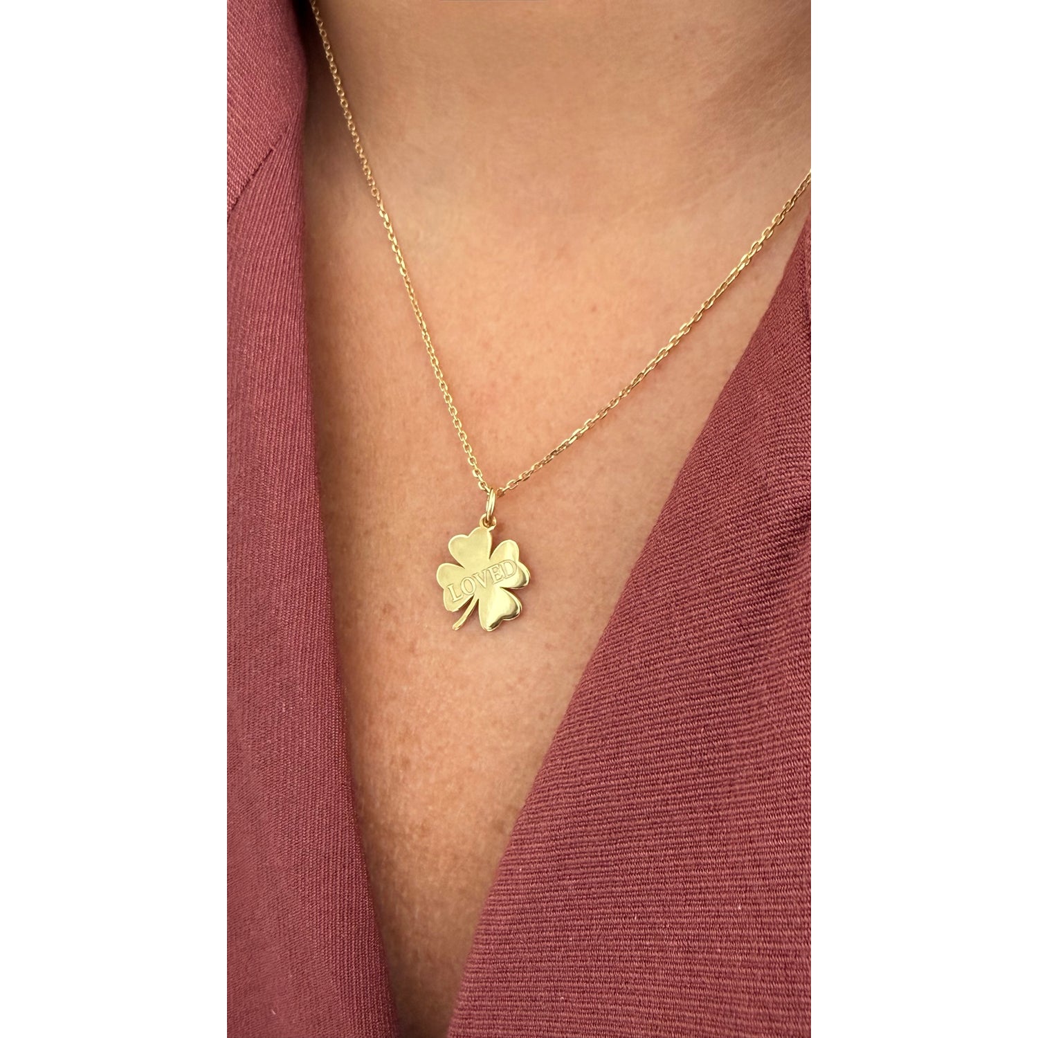 Loved Clover Necklace, LOVED, yellow gold tone, lifestyle view