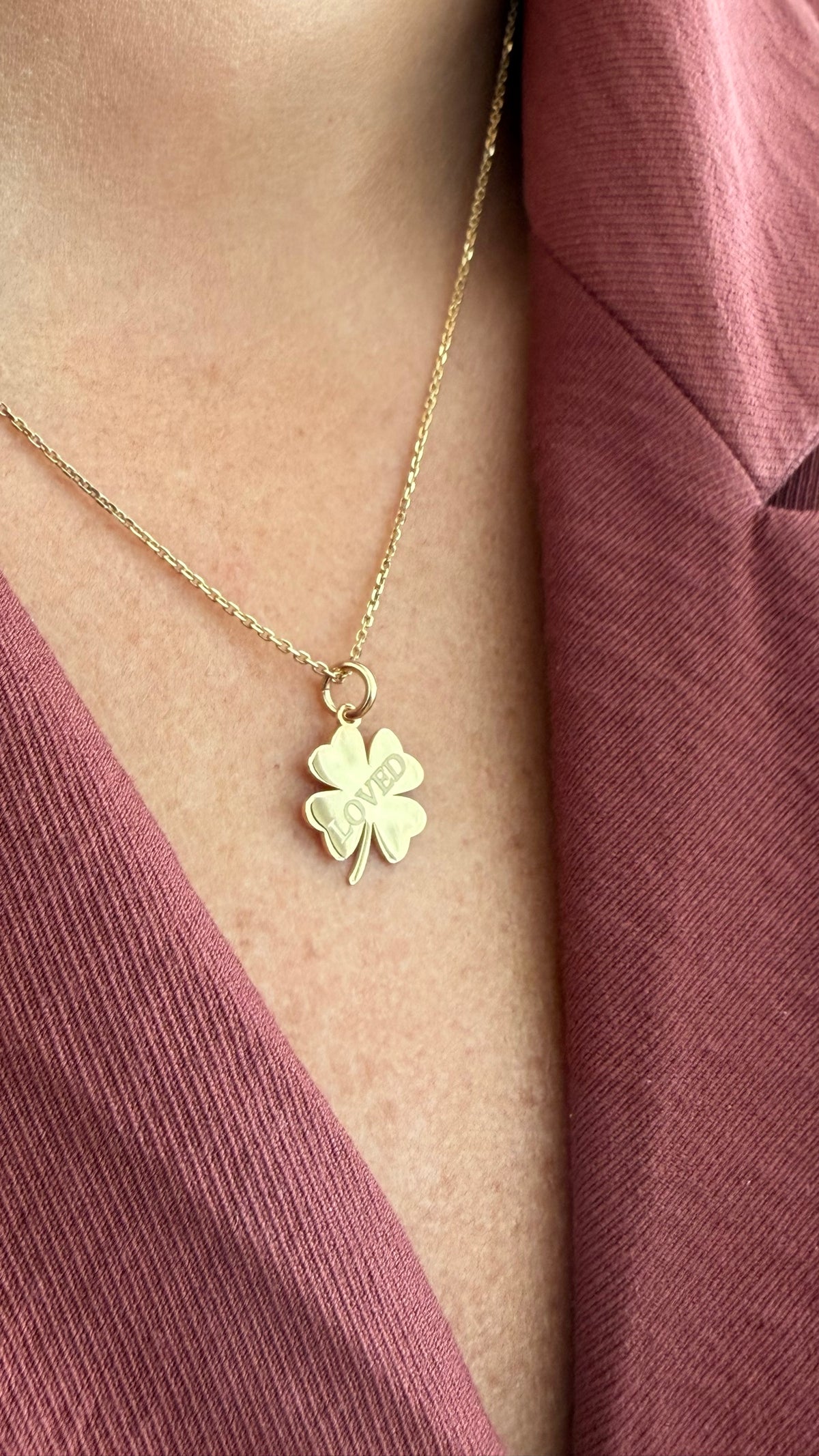 Loved Clover Necklace, LOVED, yellow gold tone, lifestyle view