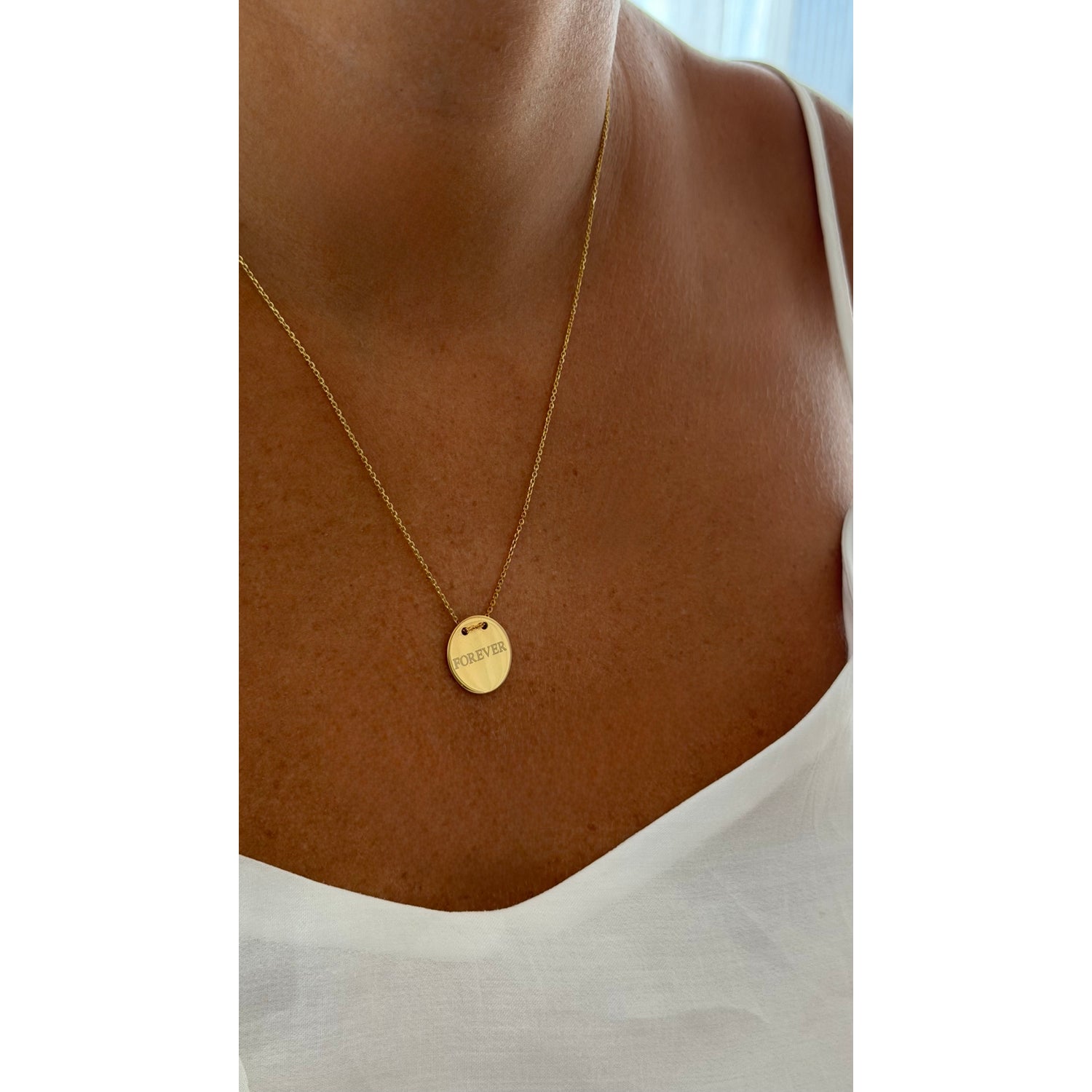 Forever Disc Necklace, FOREVER, yellow gold tone, lifestyle view