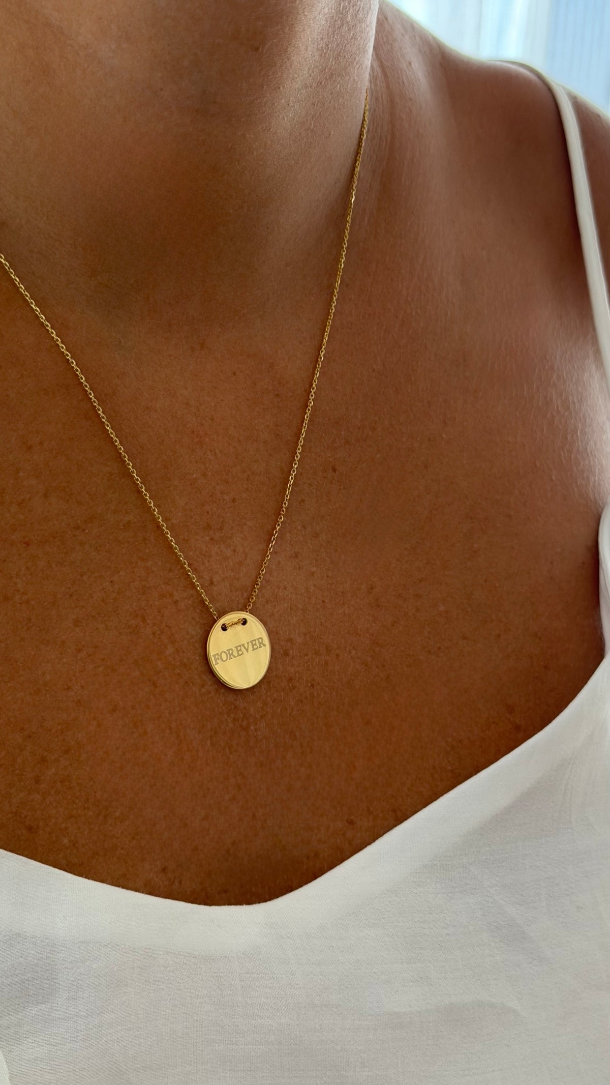 Forever Disc Necklace, FOREVER, yellow gold tone, lifestyle view