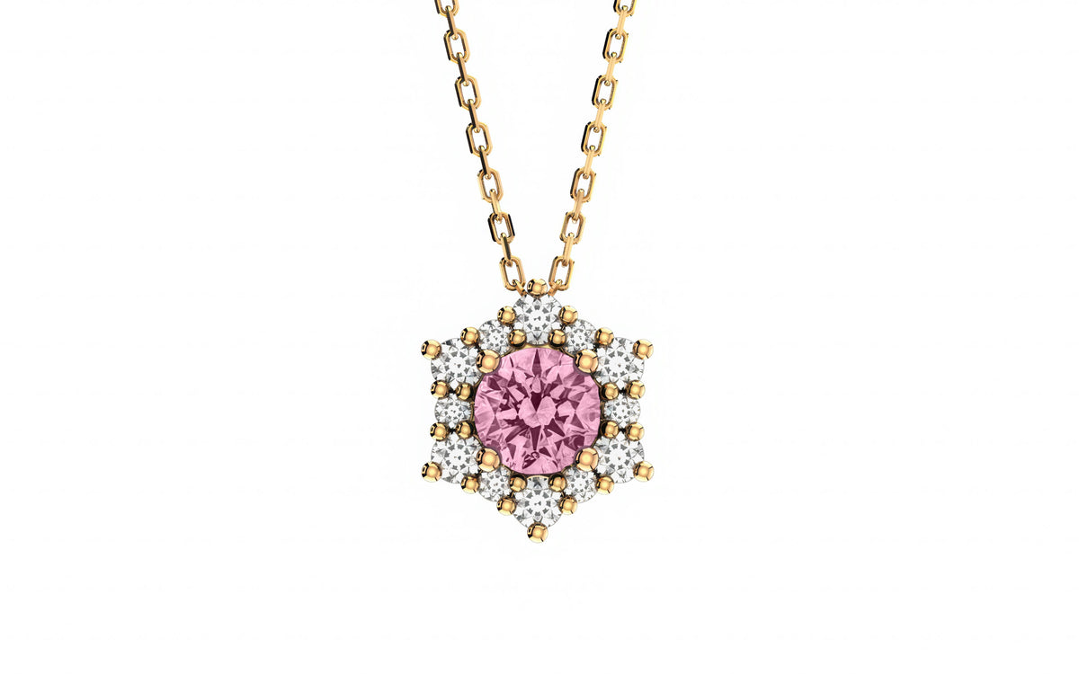 Necklace with a pink gemstone and gold chain on a white background