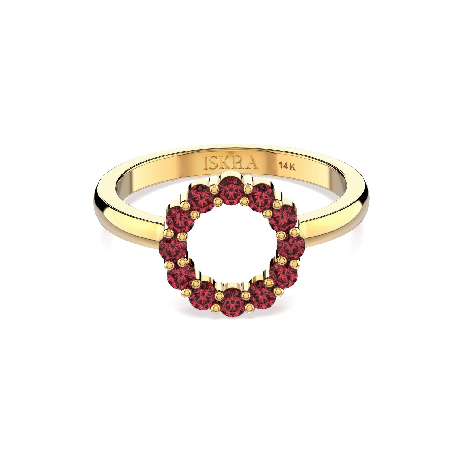 Gold ring with red gemstones on a white background