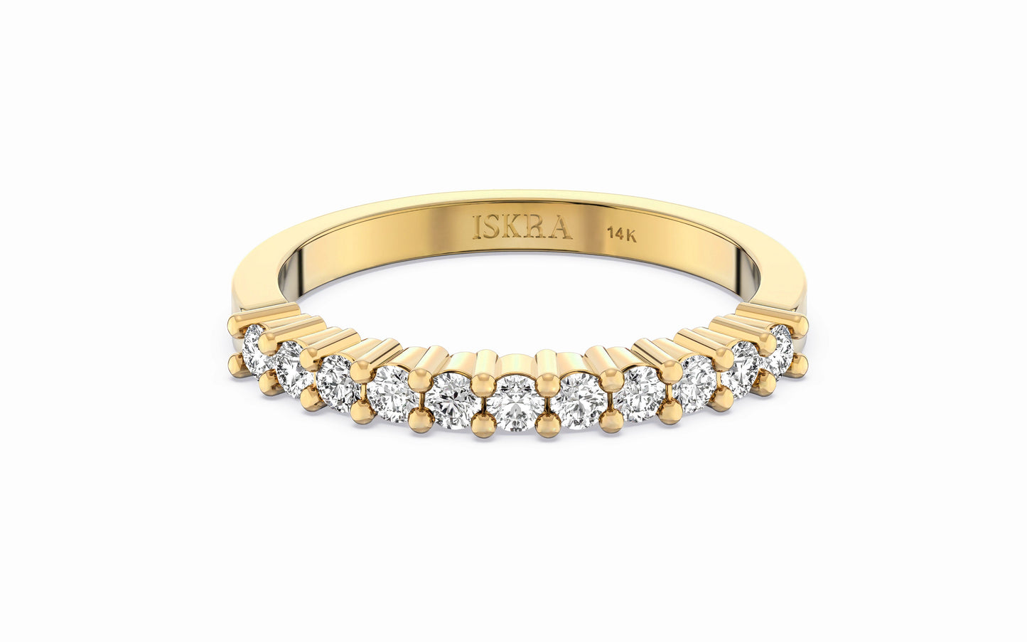 Gold ring with diamonds on a white background, featuring the brand 'ISKRA'.