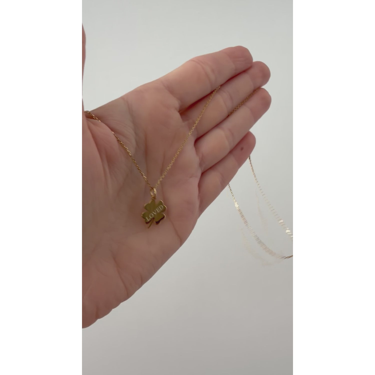 Loved Clover Necklace, LOVED, yellow gold tone, lifestyle video