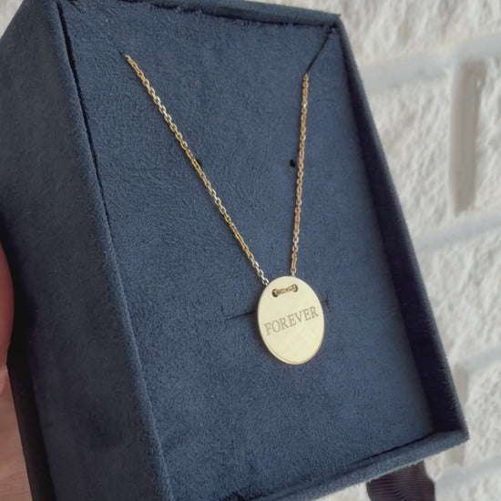 Forever Disc Necklace, FOREVER, yellow gold tone, lifestyle video