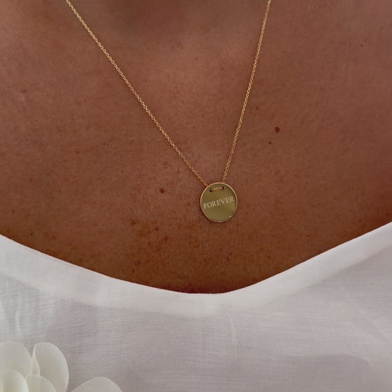 Forever Disc Necklace, FOREVER, yellow gold tone, lifestyle video